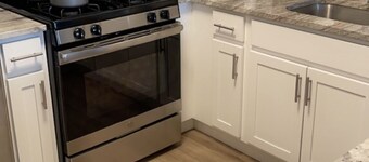 Posh Luxurious Getaway w/ Rental Car + Garaged parking