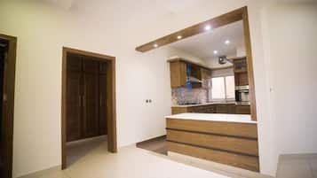 Habitación doble Deluxe | Cocina compartida