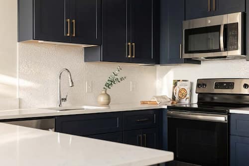 Appartement, 2 chambres | Cuisine privée | Grand réfrigérateur, cafetière/bouilloire, bouilloire électrique