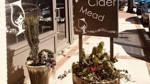 A storefront with a sign advertising beer, wine, and cider. - 724A · The Blue Bungalow - Min to Downtown and Airport! (Atlanta)