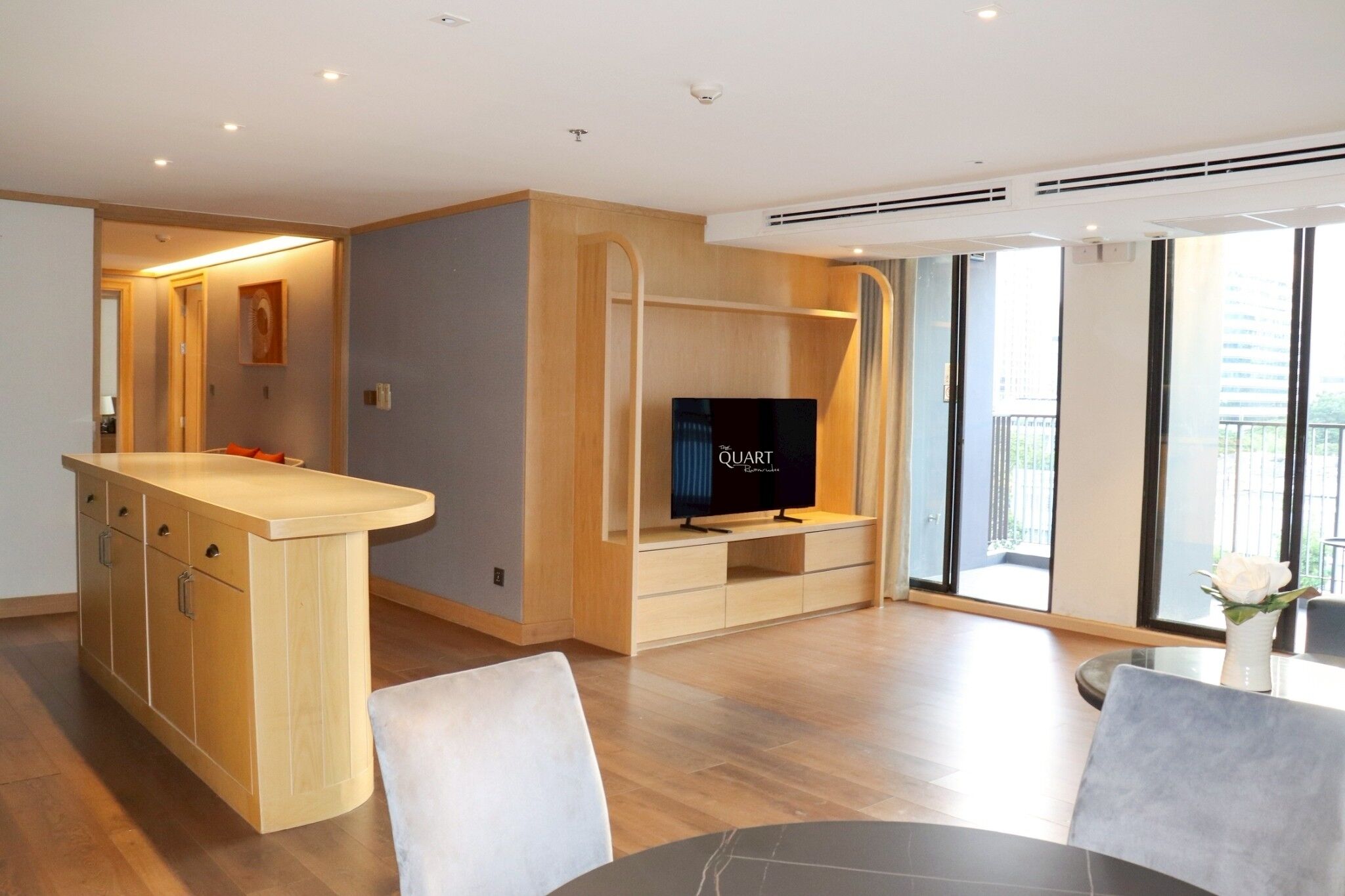 Two Bedroom Family Suite | Living area | 50-inch LED TV with cable channels, TV