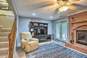 TV, fireplace, books - Burke Family Home w/ Deck & Easy City Access! (Burke)