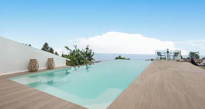 Vacation Home "Casa Adayeim 2" with Mountain View, Sea View, Shared Pool, Wi-Fi, Terrace & Garden