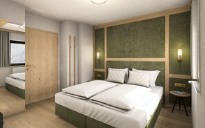 A modern hotel room with a large bed, a wooden wardrobe, a small round table, and a wall-mounted TV.