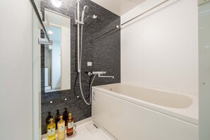 Japanese suite | Bathroom | Separate tub and shower, hair dryer, slippers, electronic bidet