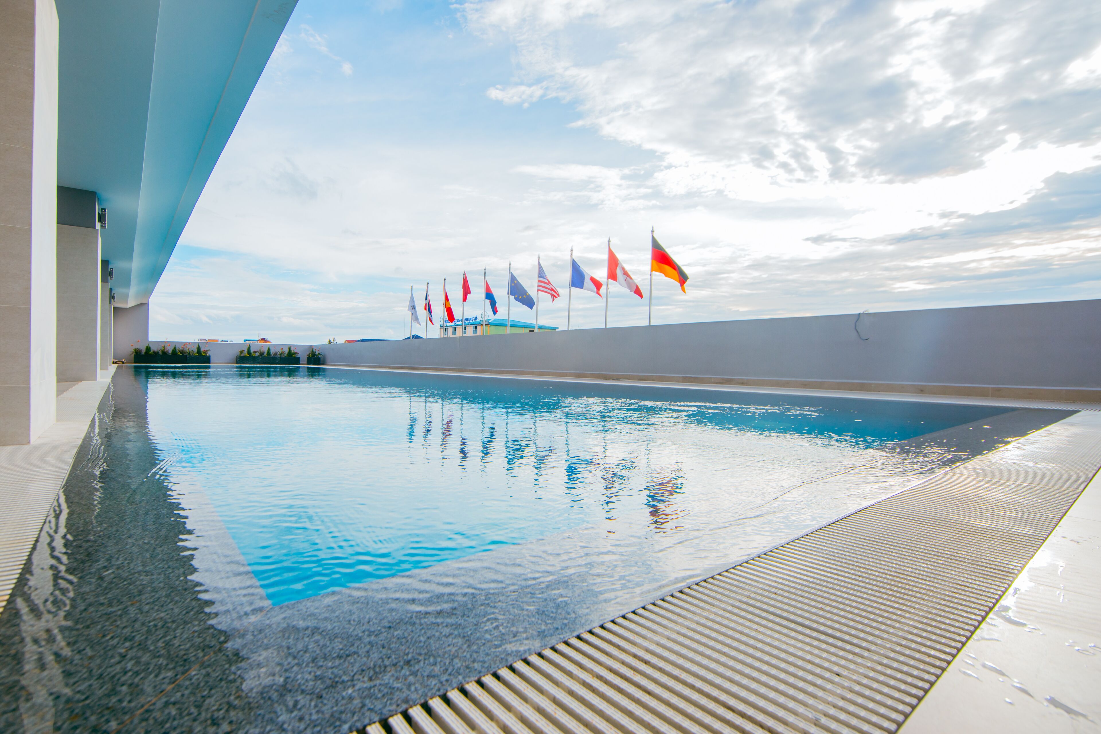 2 outdoor pools, open 6:00 am to 9:00 pm, pool umbrellas, pool loungers