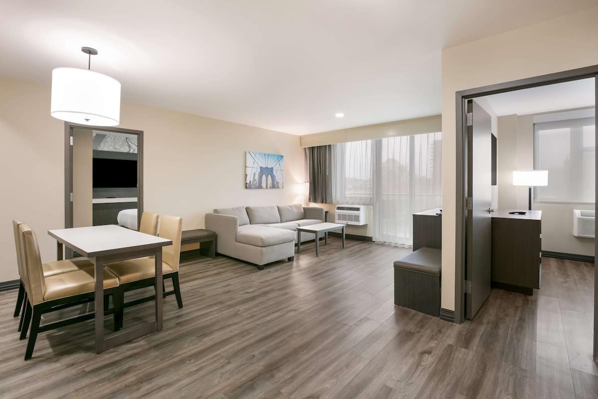 Suite, Multiple Beds, Non Smoking, Kitchenette (with Sofabed) | Laptop workspace, cribs (free), WiFi (free), bed sheets