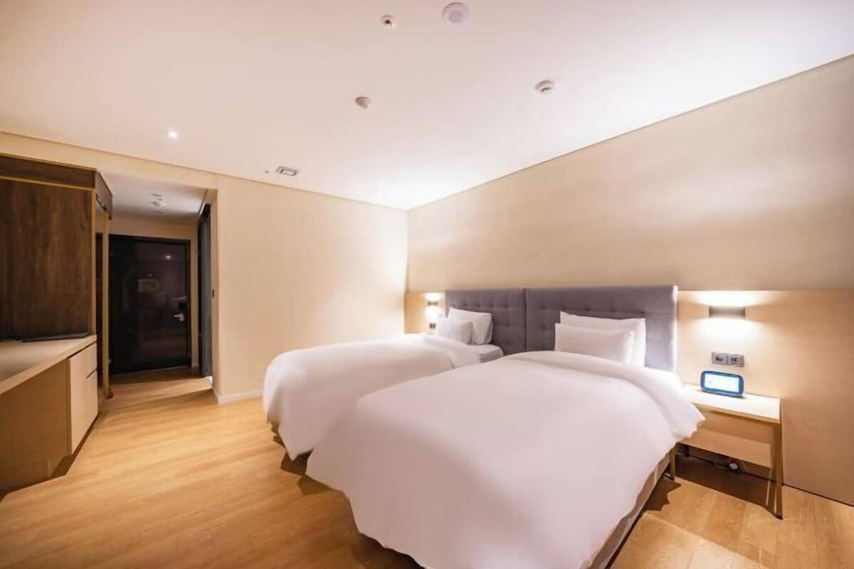 Premium bedding, down duvets, iron/ironing board (on request), free WiFi