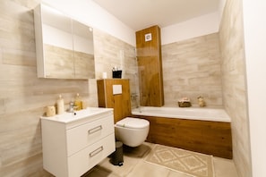 Combined shower/bathtub