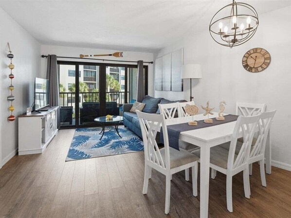 TV - Waterfront 1BR condo in Marco Island with pool, marina, WiFi, and kitchen. (Marco Island)