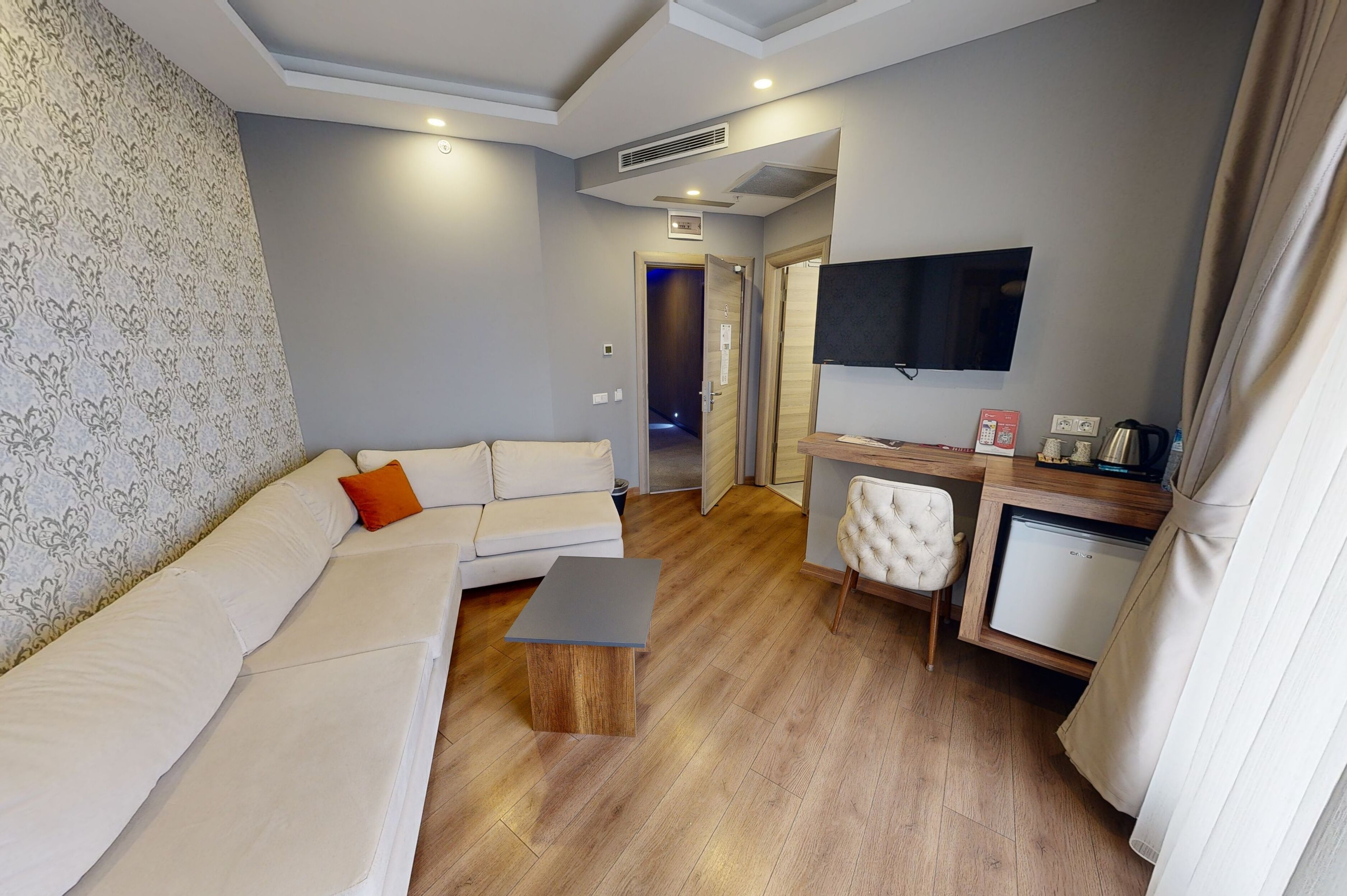 junior suite | living area | 39-inch led tv with satellite channels, tv