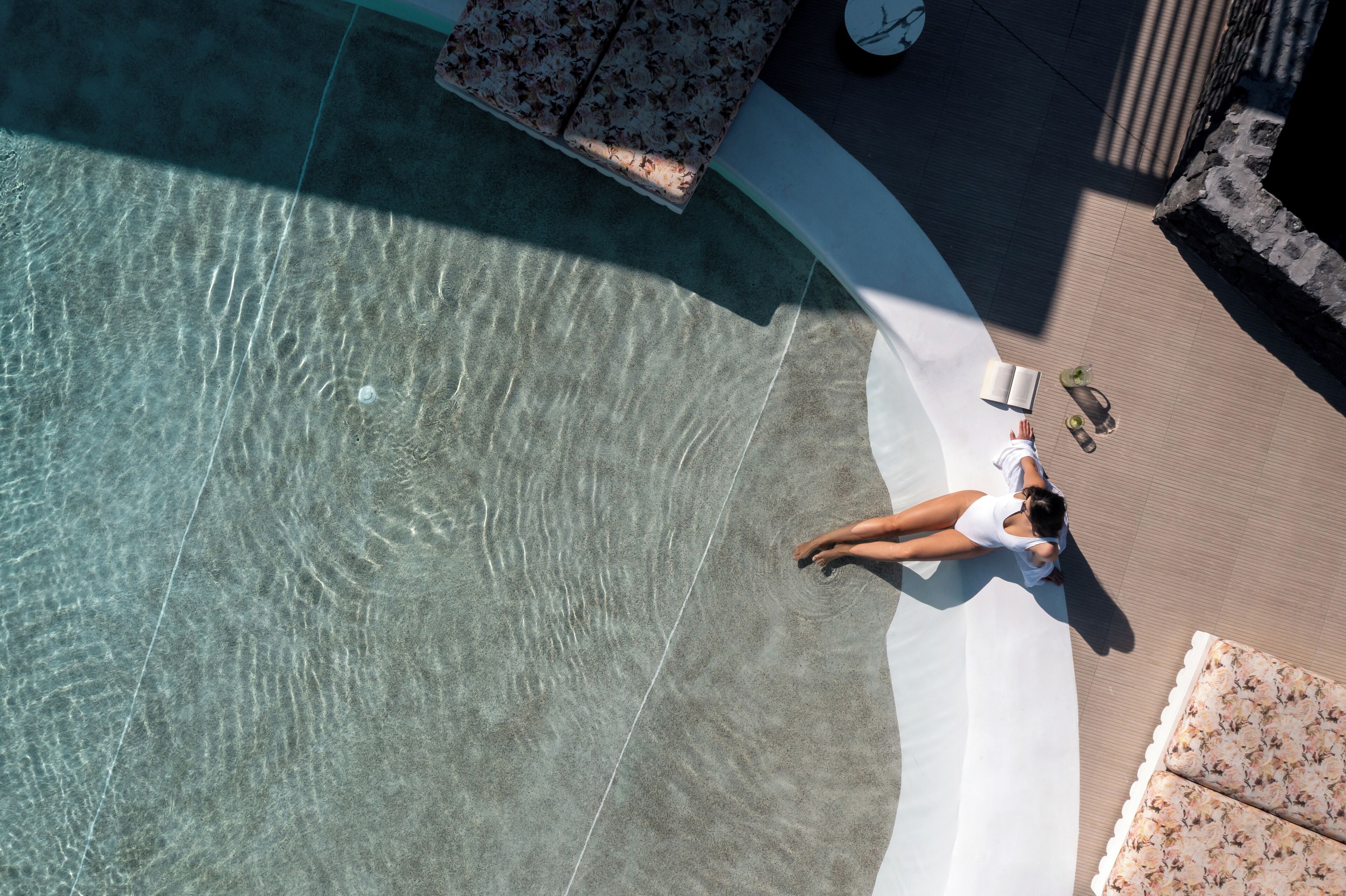 Seasonal outdoor pool, open 11:00 AM to 7:30 PM, pool umbrellas
