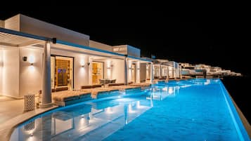 Seasonal outdoor pool, open 11:00 AM to 7:30 PM, pool umbrellas