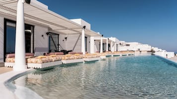Outdoor pool, open 11:00 AM to 7:30 PM, pool umbrellas, pool loungers