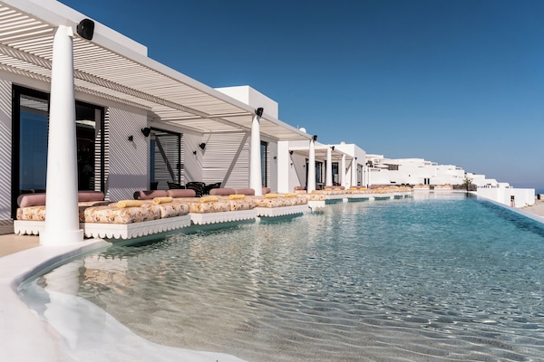 Outdoor pool, open 11:00 AM to 7:30 PM, pool umbrellas, sun loungers