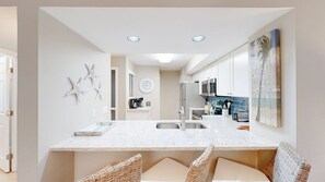 Fridge, microwave, coffee/tea maker, toaster