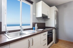 Micro-ondas, fogão, cooktop, cafeteira/chaleira