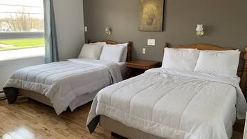Deluxe Studio Suite, City View, Courtyard Area | 1 bedroom, premium bedding, individually furnished, desk