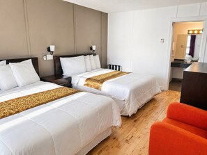 Premium bedding, individually furnished, desk, laptop workspace