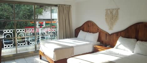 Deluxe Quadruple Room | Free WiFi, bed sheets