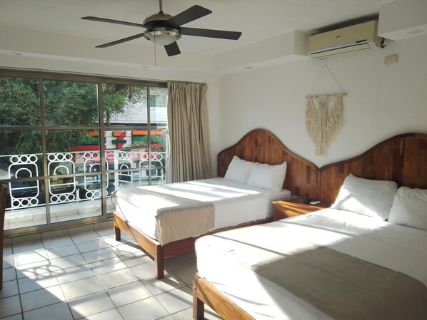 Chambre Quadruple Deluxe | Wi-Fi gratuit, draps fournis