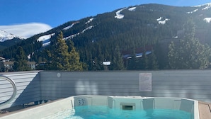 A hot tub with a view of a snowy mountain and forest. - 3 min Walk to Slopes, Great Views, Shared Hot Tub  (Frisco)
