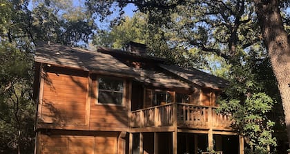 Cedar Cabin on Stilts with 2 decks in the Trees by Lake Lewisville 