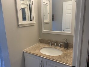 Combined shower/bathtub, hair dryer, towels, soap