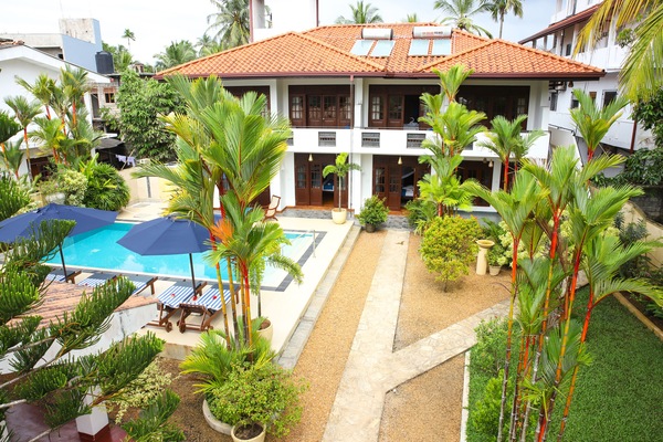Guesthouse with Main Building, Pool and Garden Area