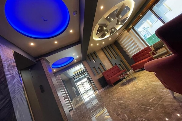 Classic Suite, 2 Bedrooms, City View | Living area | 82-cm LCD TV with satellite channels, TV