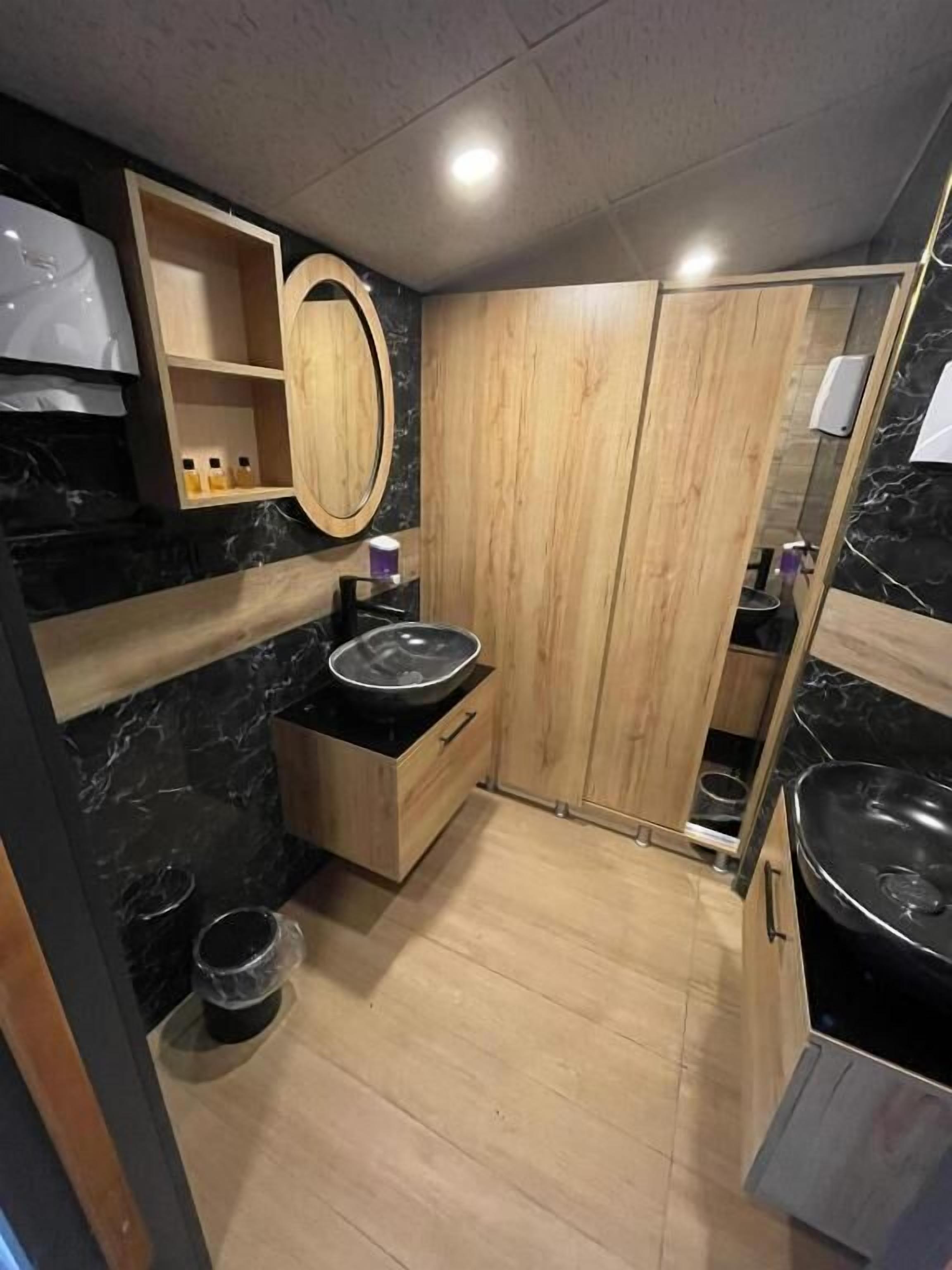 shower, rainfall showerhead, slippers, towels