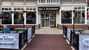 A brick building with a sign reading "The Office Bar & Restaurant". - Peaky Blinder themed hotel rooms/studio apartments (Dudley)