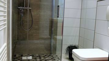 Shower, hair dryer, bathrobes, towels