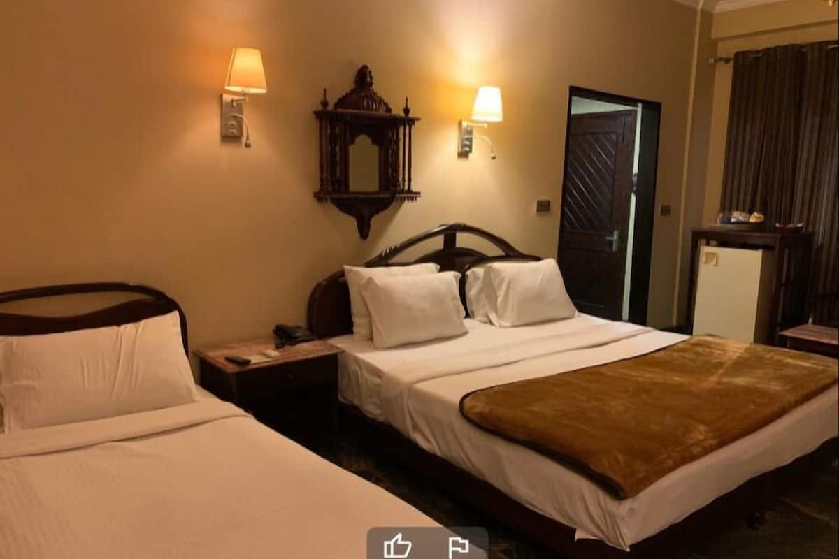 Deluxe Triple Room | Iron/ironing board, free WiFi, bed sheets