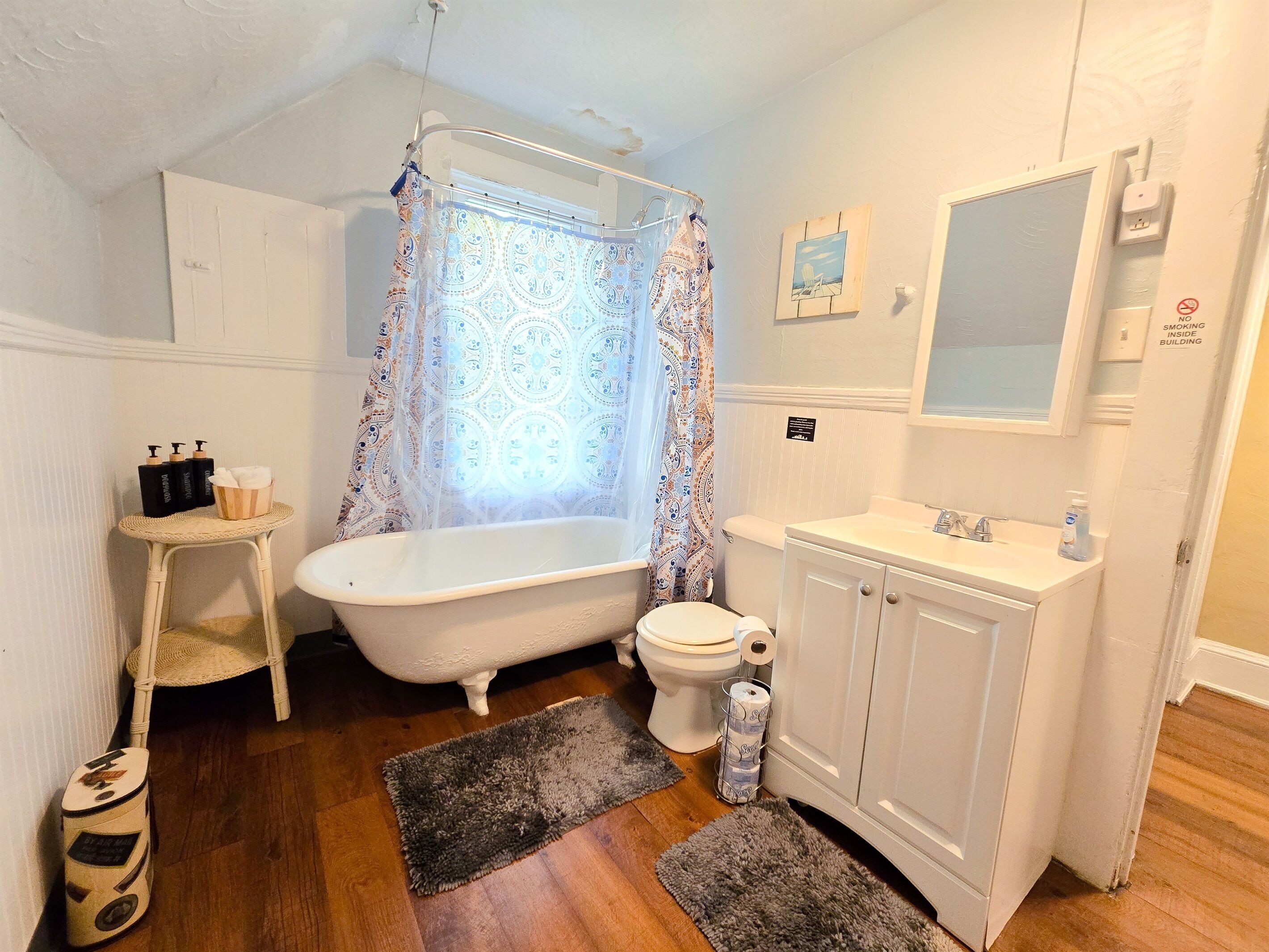 Bathtub, hair dryer, towels, soap