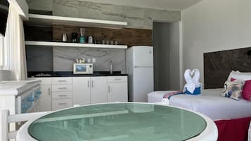 Fridge, microwave, stovetop, coffee/tea maker