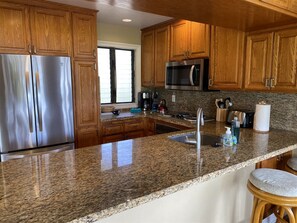 Fridge, microwave, oven, stovetop - Lae Nani 311 Ground Floor Ocean Front Condo Located only Steps to the Beach (Kapaʻa)