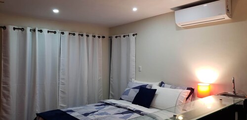 Room #2 private bathroom, surrounded by garden in a private house.