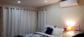 Room #2 private bathroom, surrounded by garden in a private house.