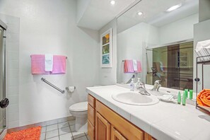 Combined shower/tub, hair dryer, towels, soap