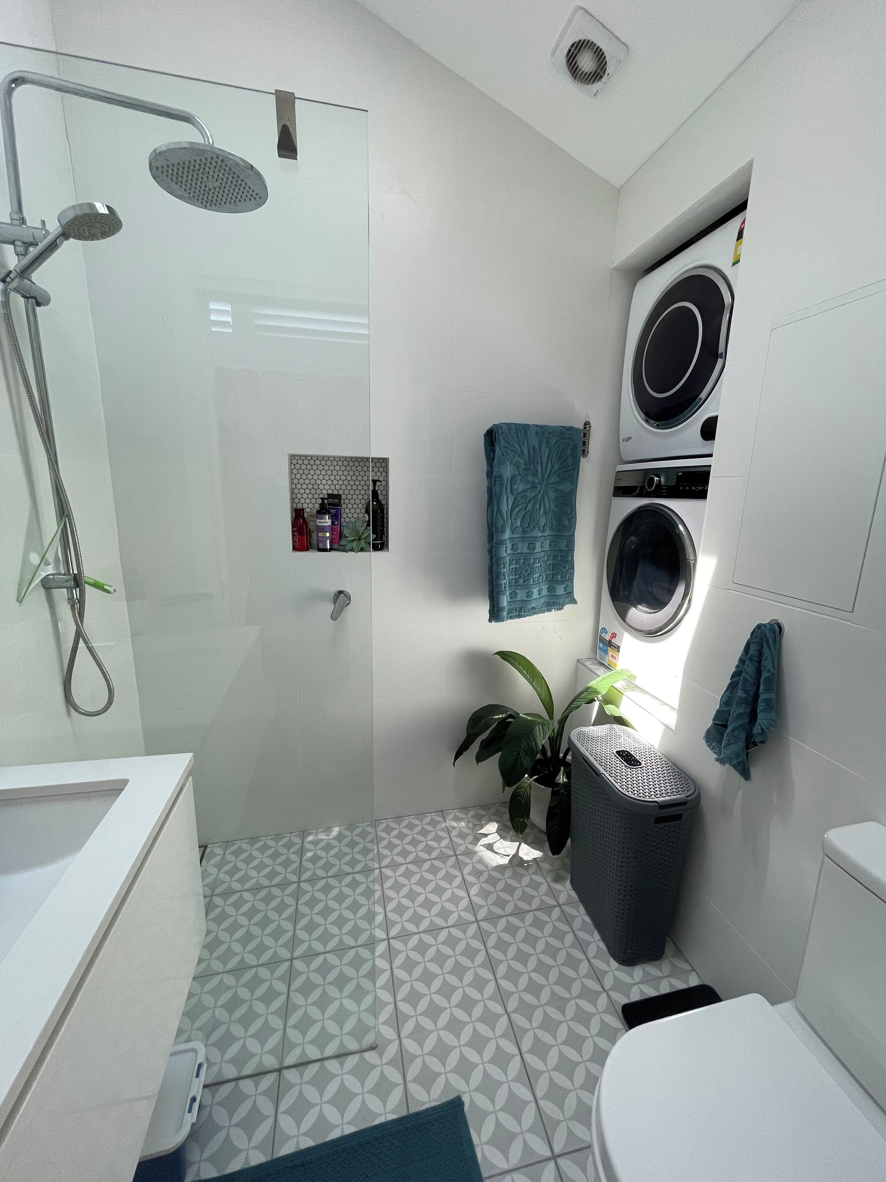 Shower, hair dryer, towels, soap