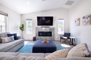 Smart TV, fireplace, ping pong, video library