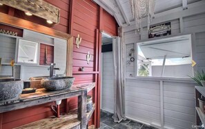 Shower, hair dryer, towels, toilet paper