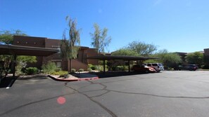 One covered parking and lots of guest parking.