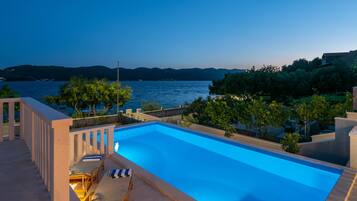 Outdoor pool, pool umbrellas, pool loungers