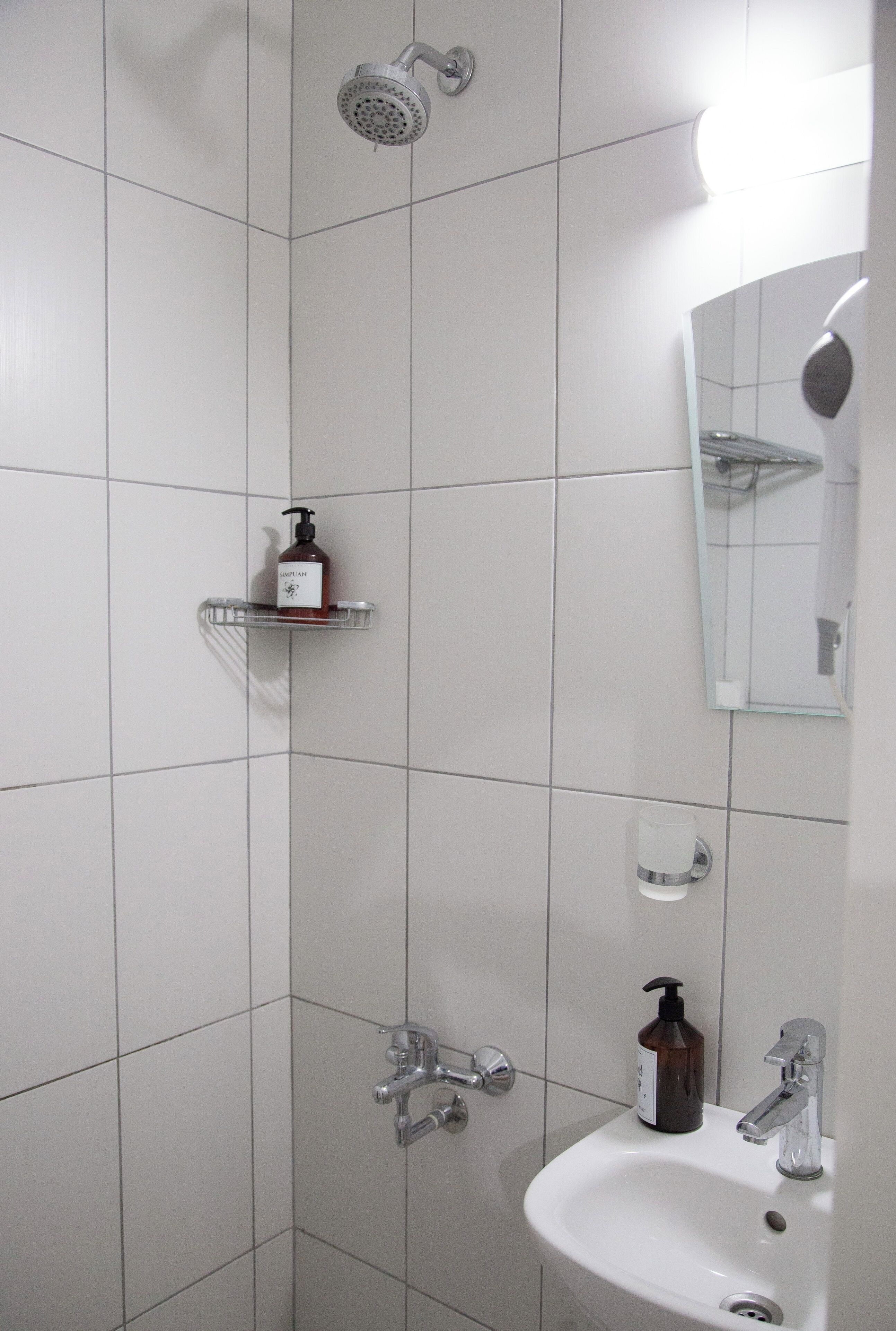 economy room - below ground floor | bathroom | shower, rainfall showerhead, designer toiletries, hair dryer