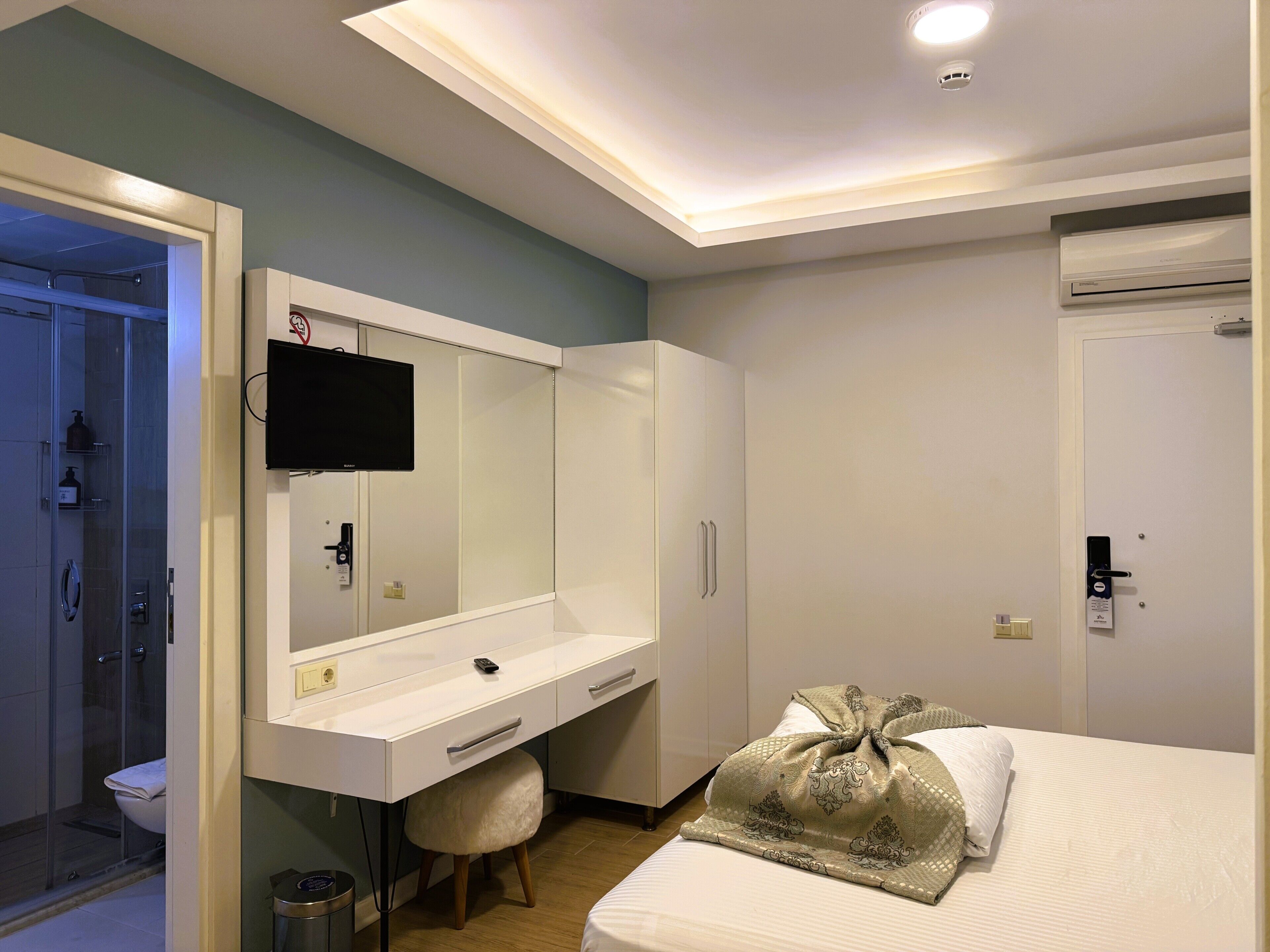 Premium bedding, down duvets, Select Comfort beds, minibar