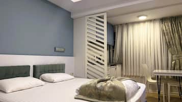 Studio Deluks, 1 Tempat Tidur King | Seprai premium, selimut bulu angsa, dan tempat tidur Select Comfort