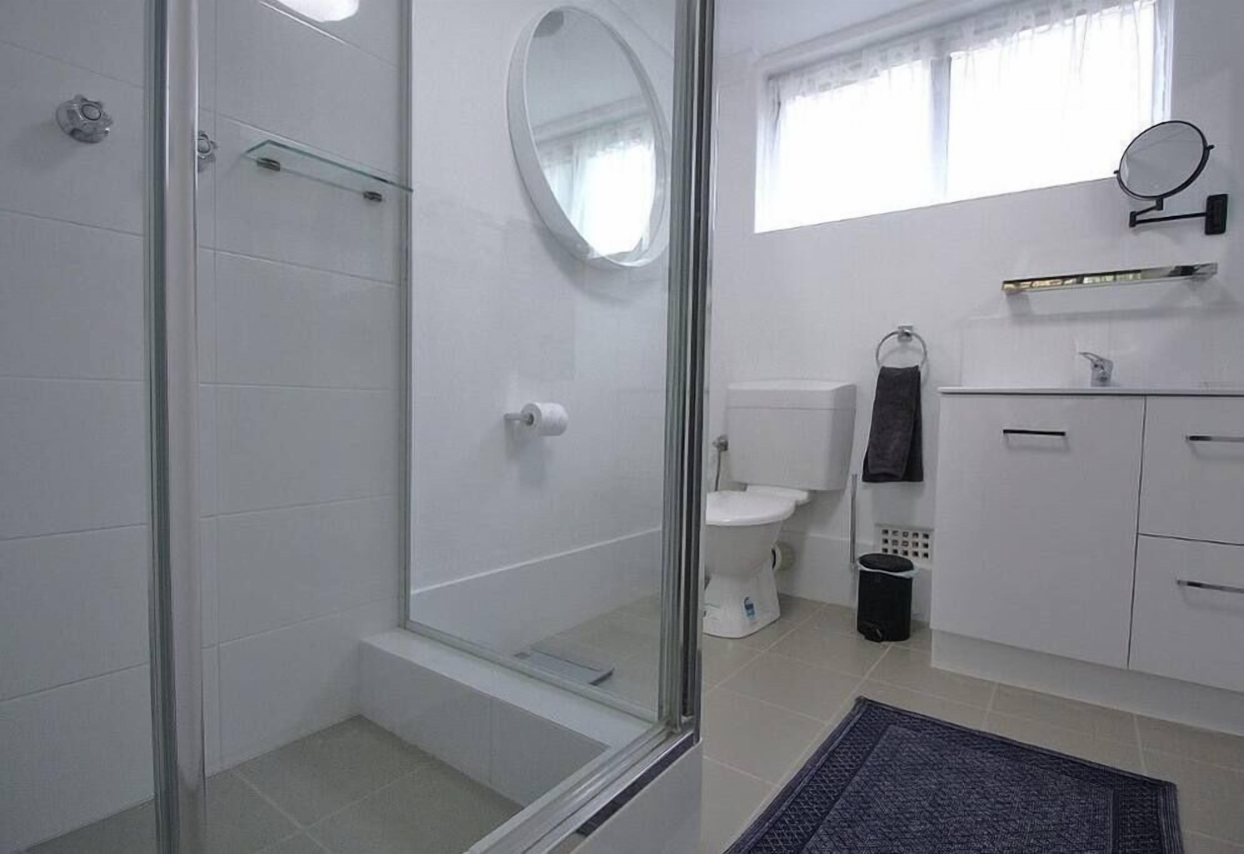Shower, hair dryer, towels, shampoo