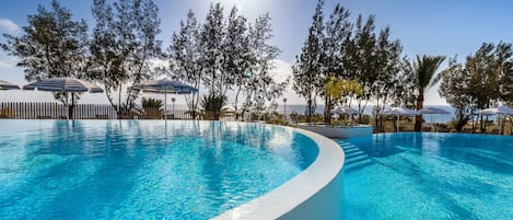 12 outdoor pools, pool umbrellas, pool loungers